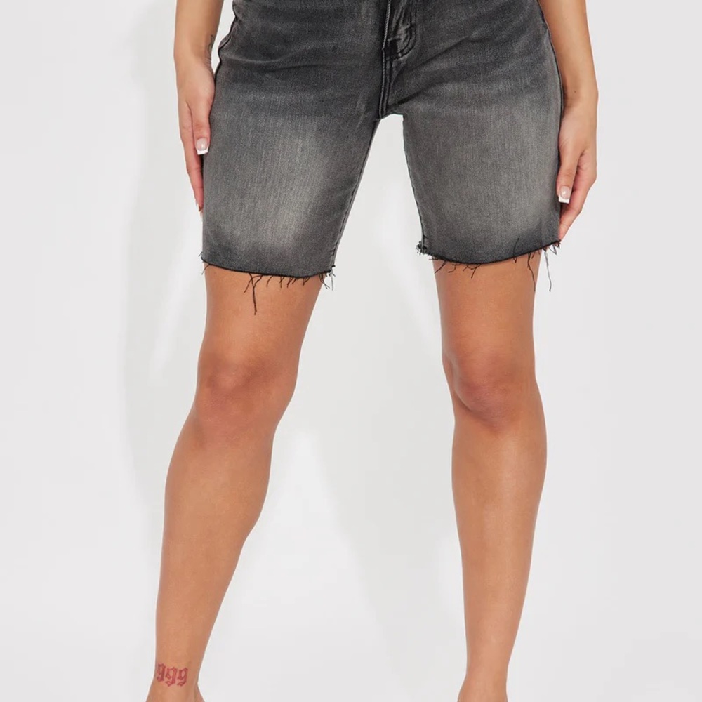 Black Jean Shorts with Distressed Finish and Raw Hem